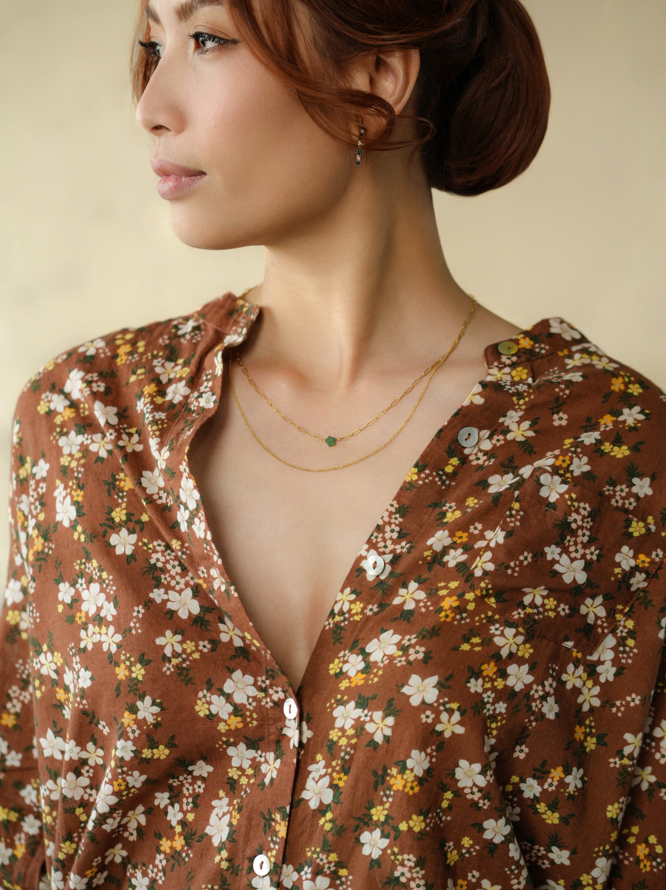 woman wearing amy floral blouse