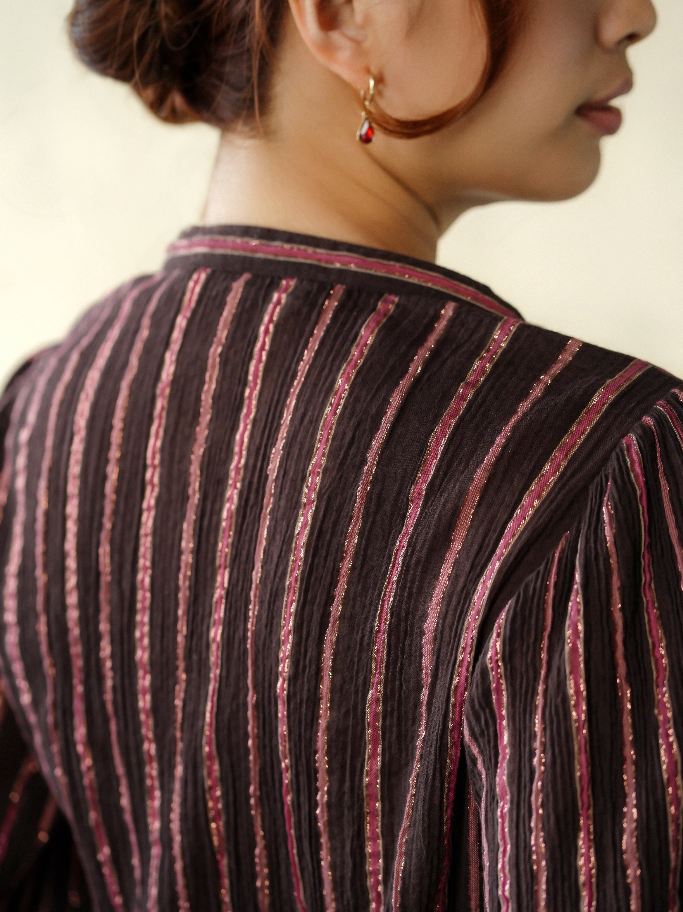 woman wearing chocolate yuni blouse
