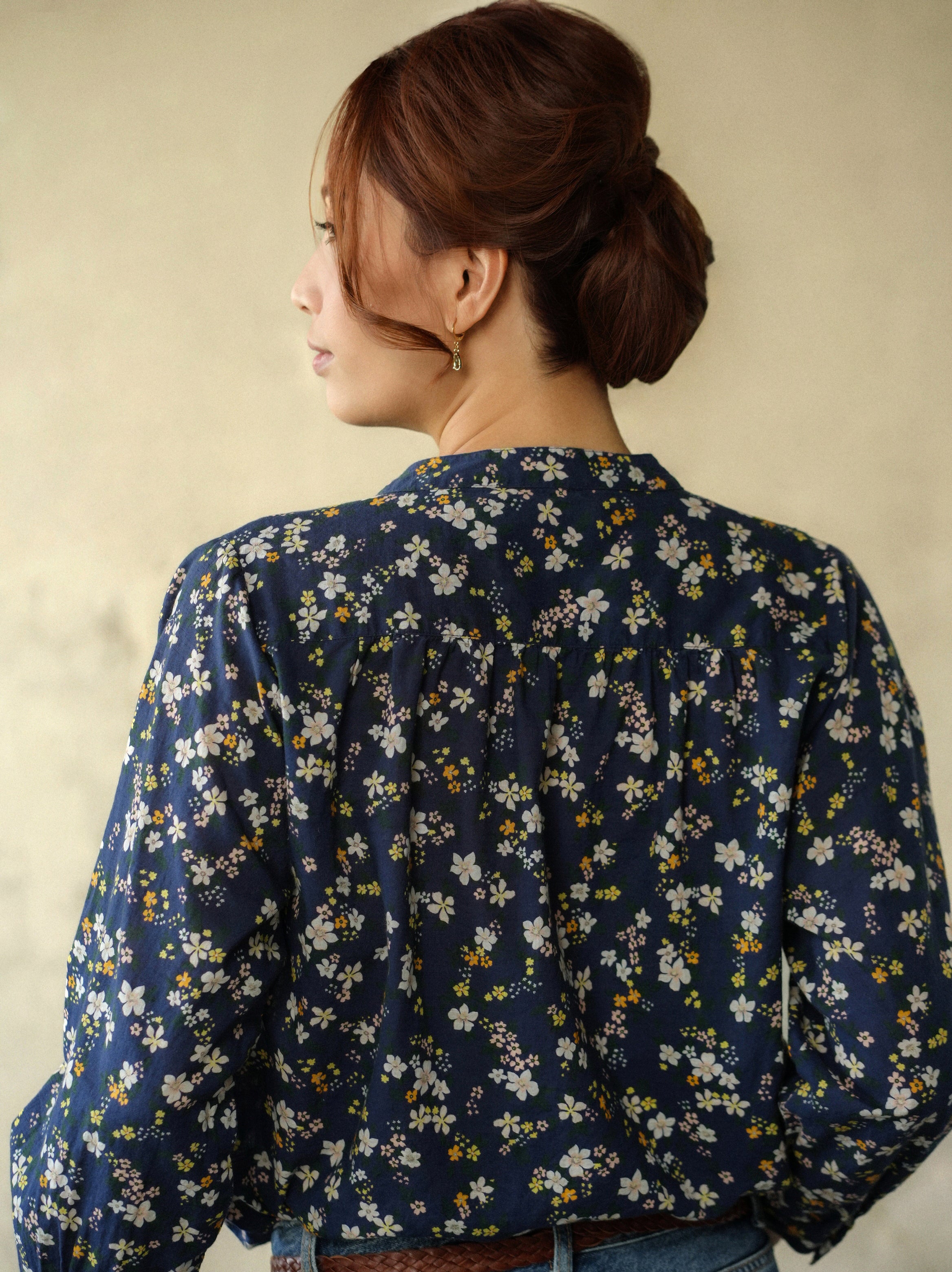 woman wearing amy floral blouse