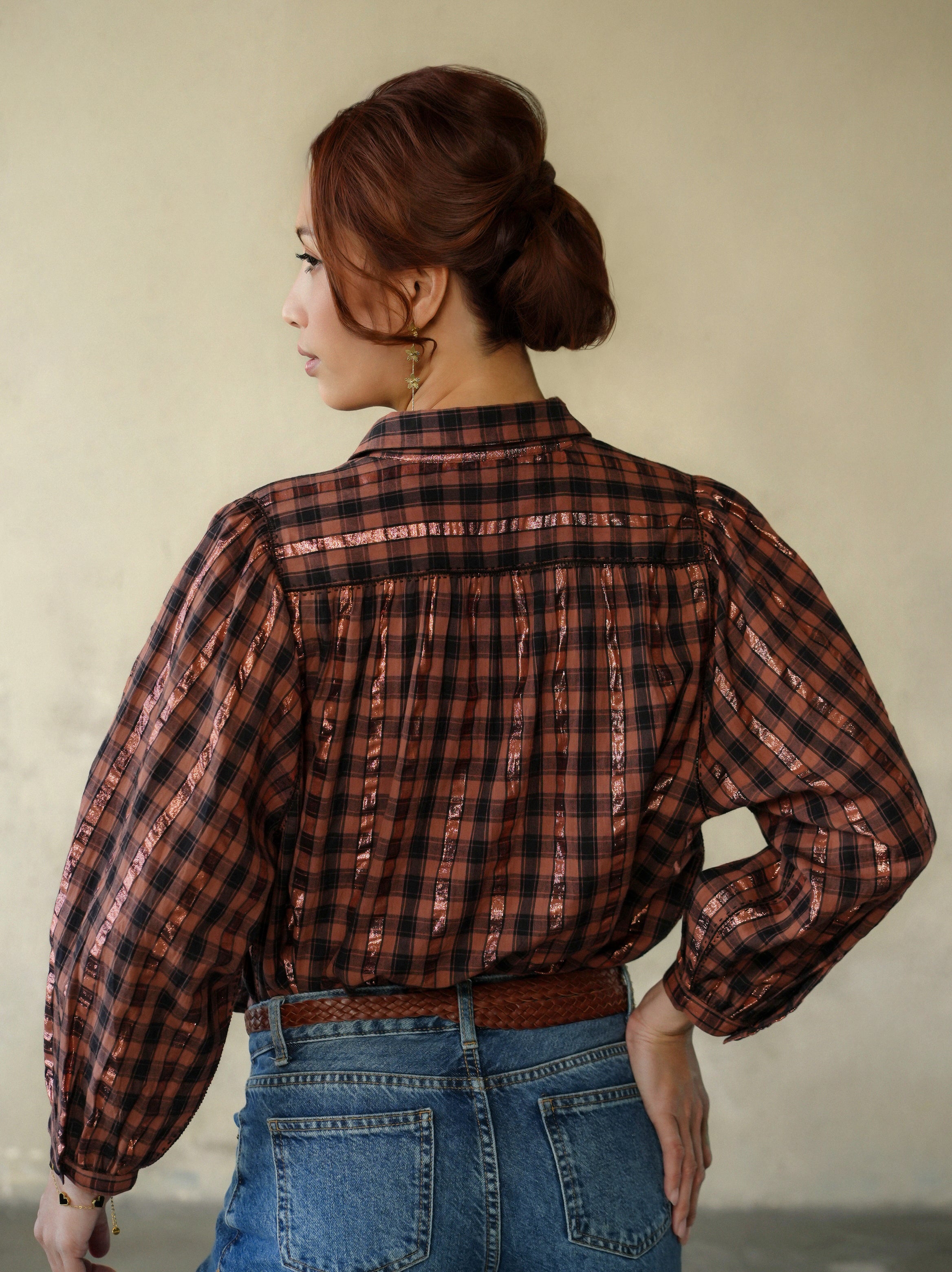 woman wearing birkin blouse rust