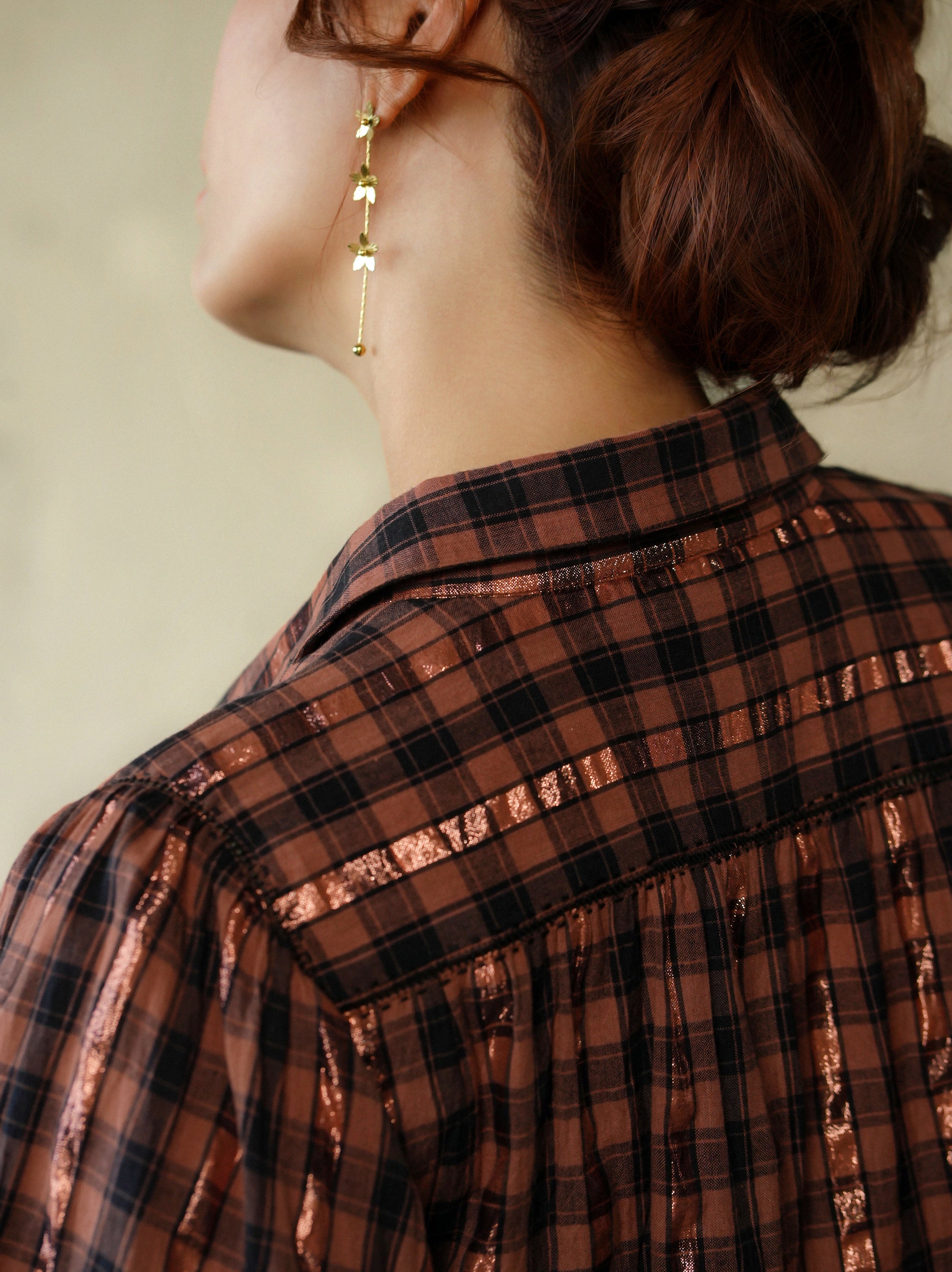 woman wearing birkin blouse rust