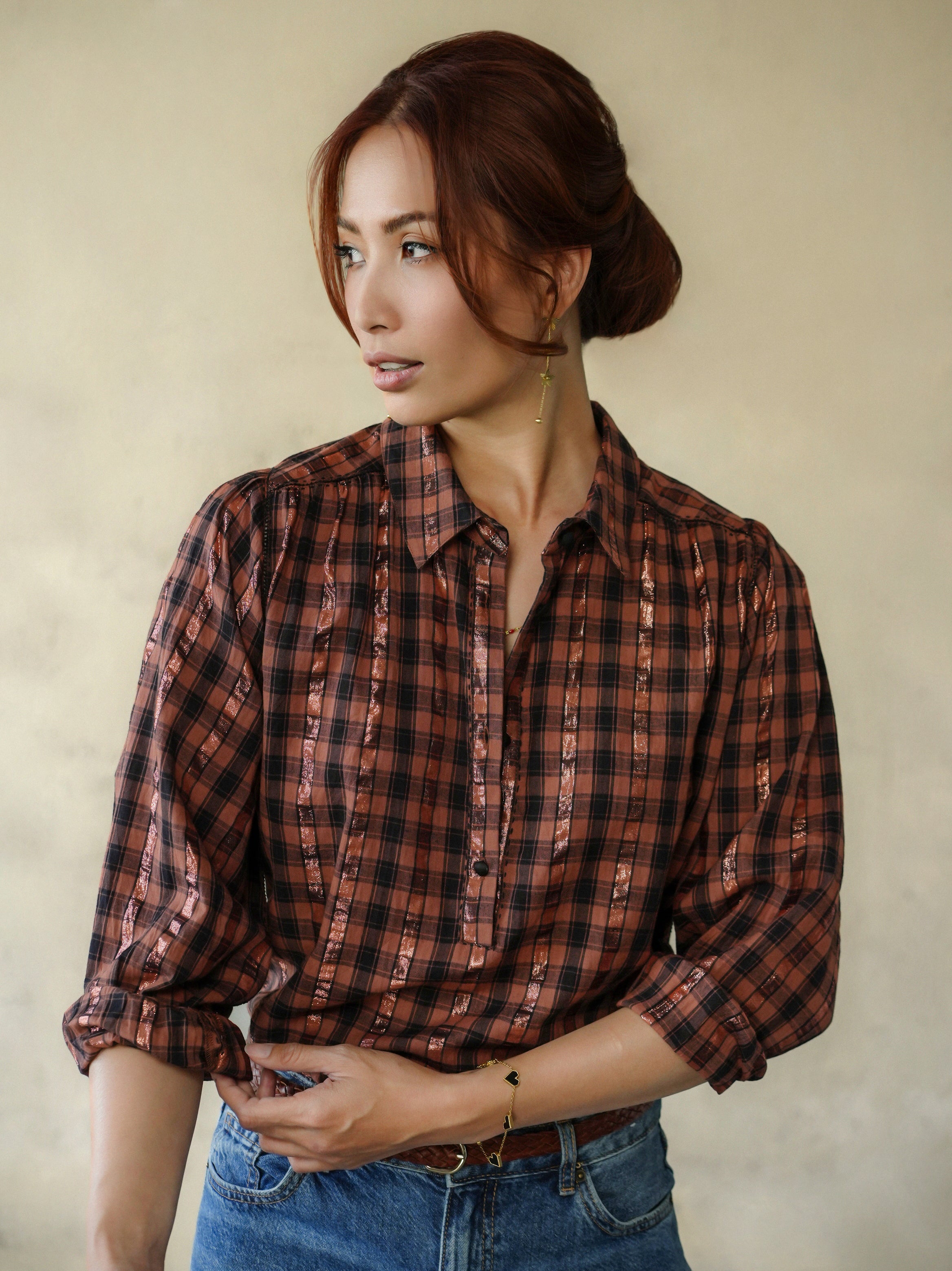 woman wearing birkin blouse rust