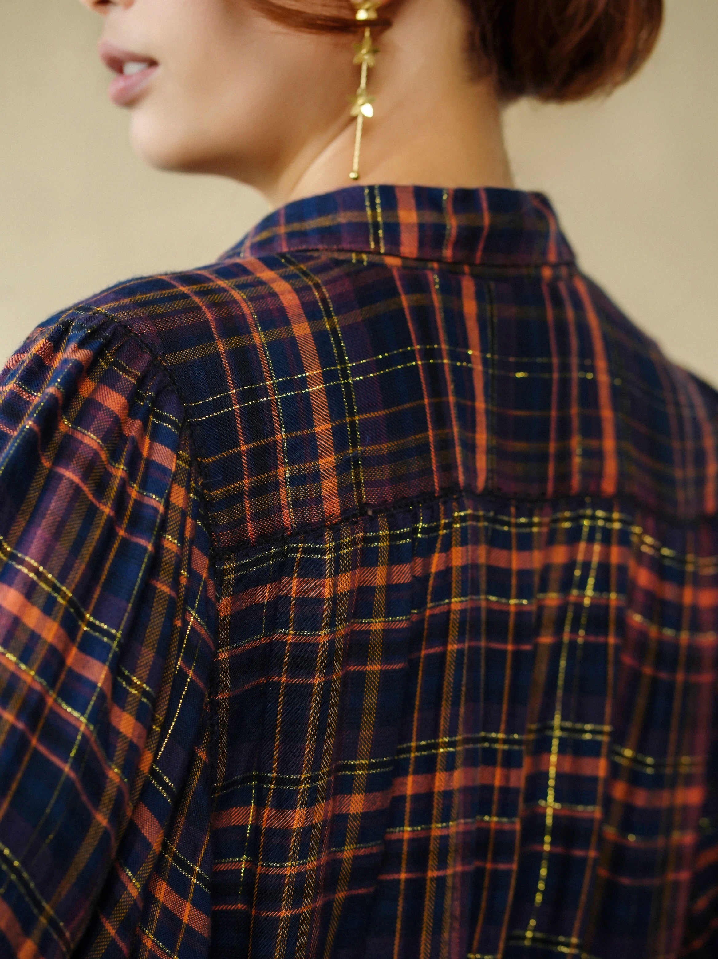 woman wearing birkin blouse rust