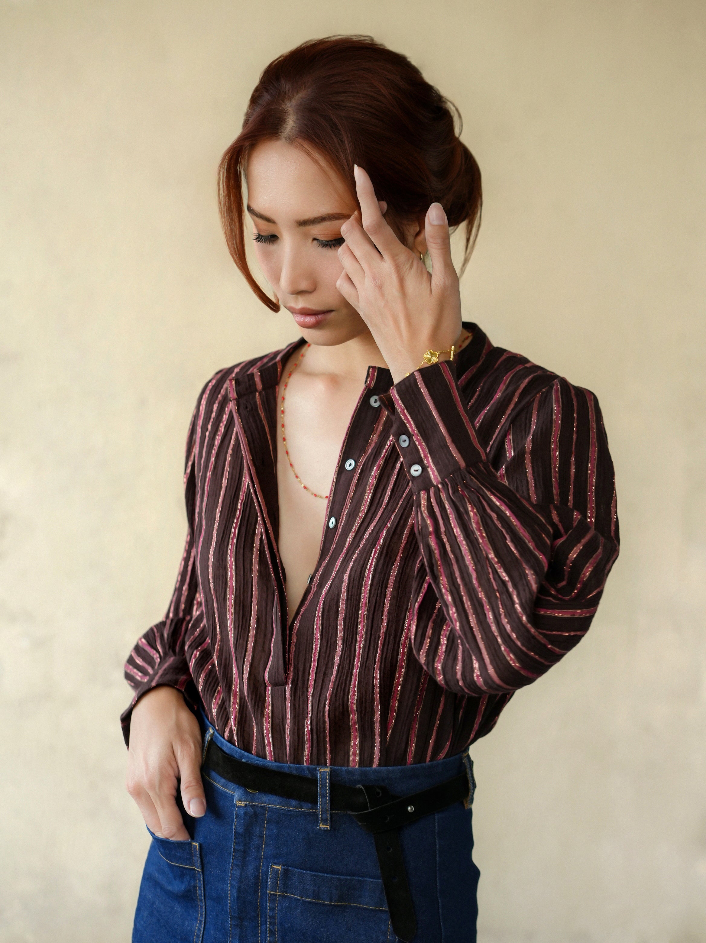 woman wearing chocolate yuni blouse